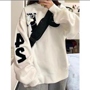 Lovely white sweater, very comfortable to wear.